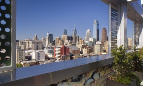 a city skyline seen from a balcony